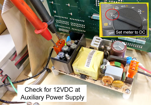 Image of meter leads at output of auxiliary power supply